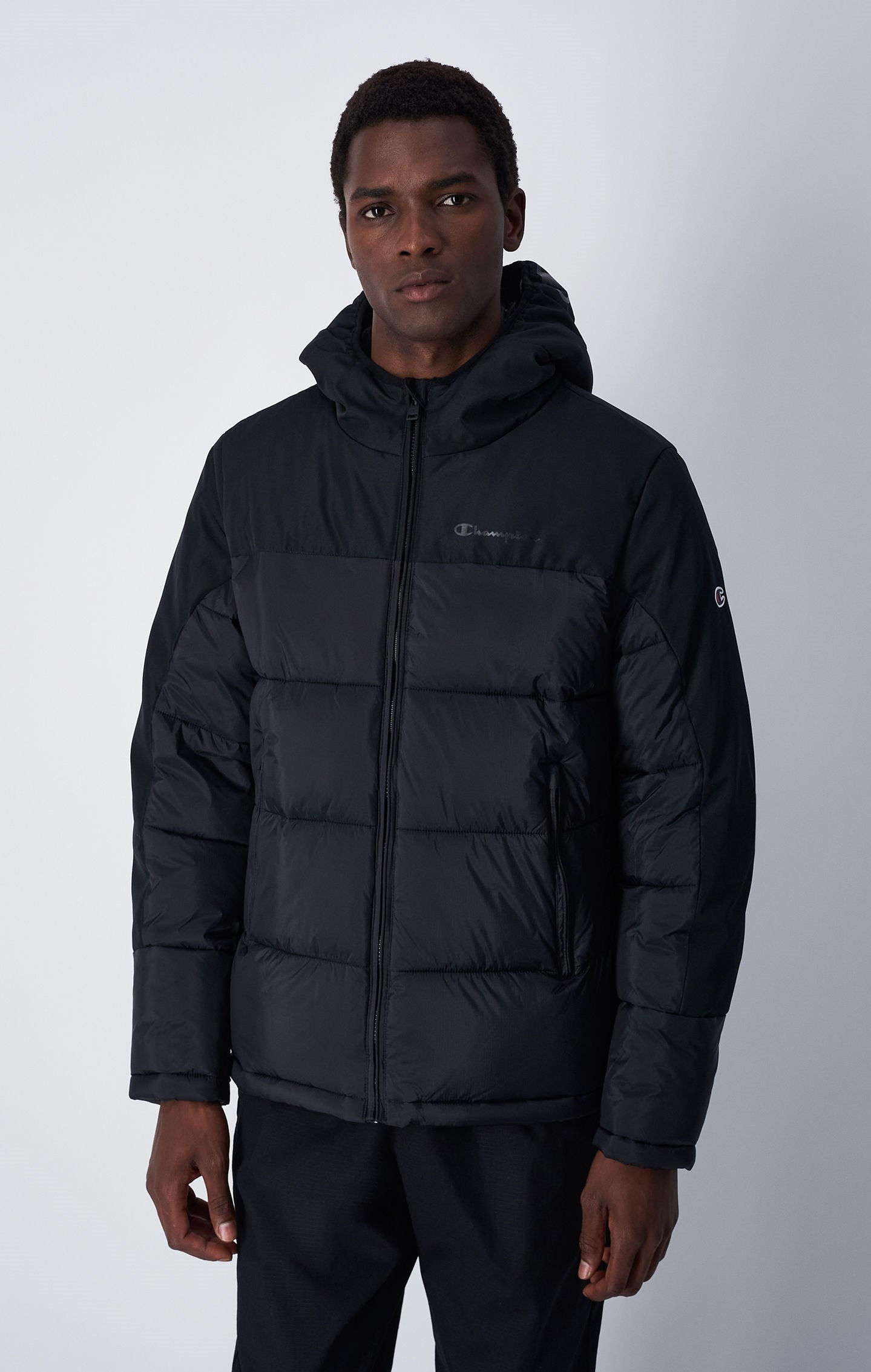 Piumino Pesante Con C Logo Patch