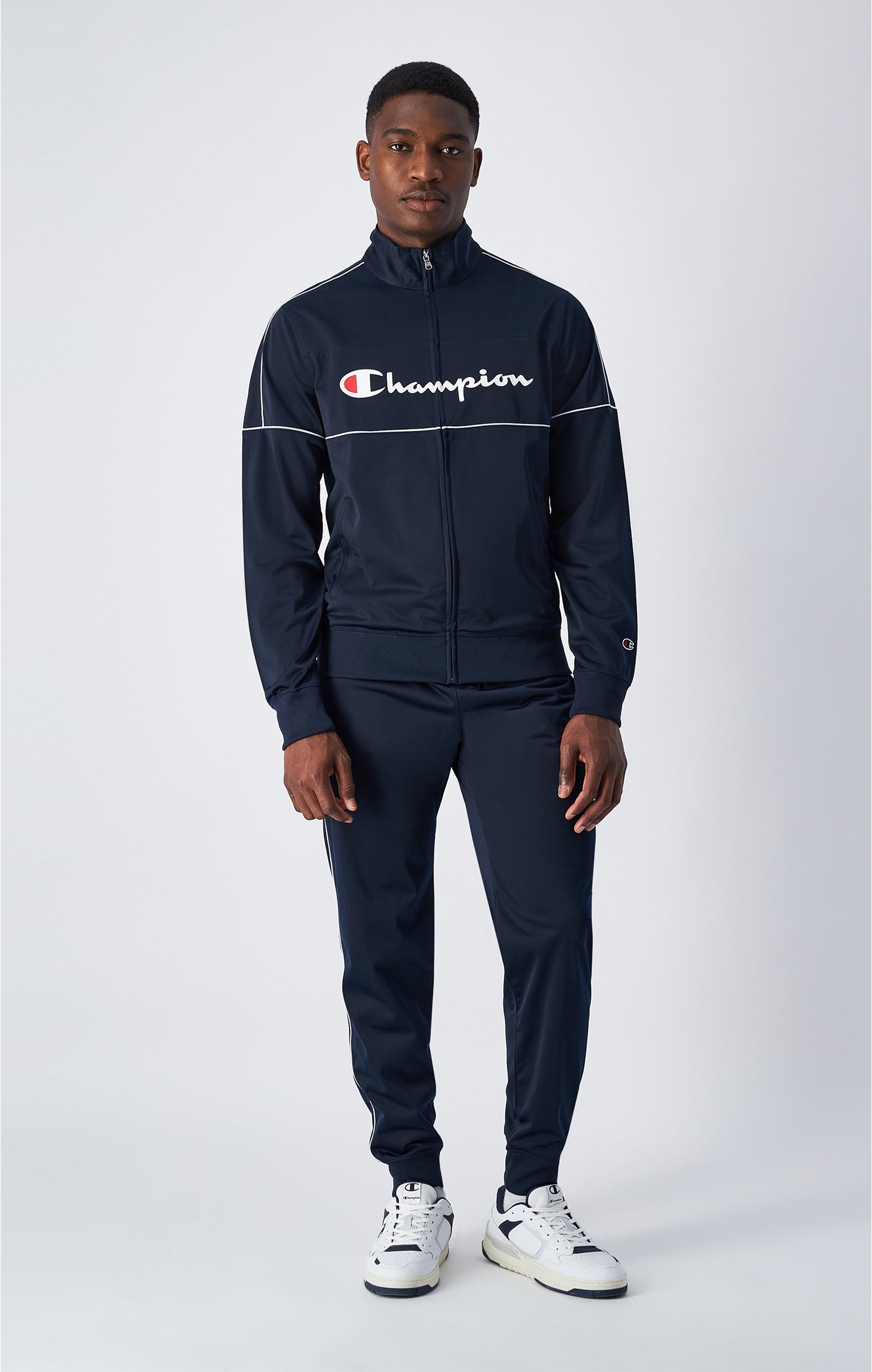 Tuta con cerniera con logo grande