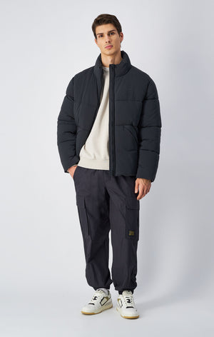 Piumino pesante a collo alto