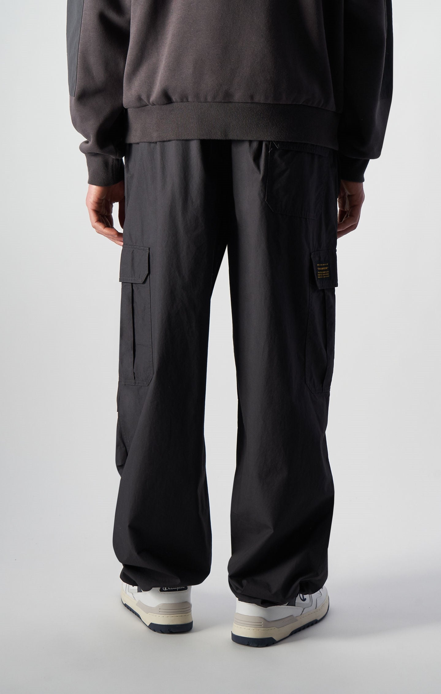 Pantaloni parachute con lavaggio vintage