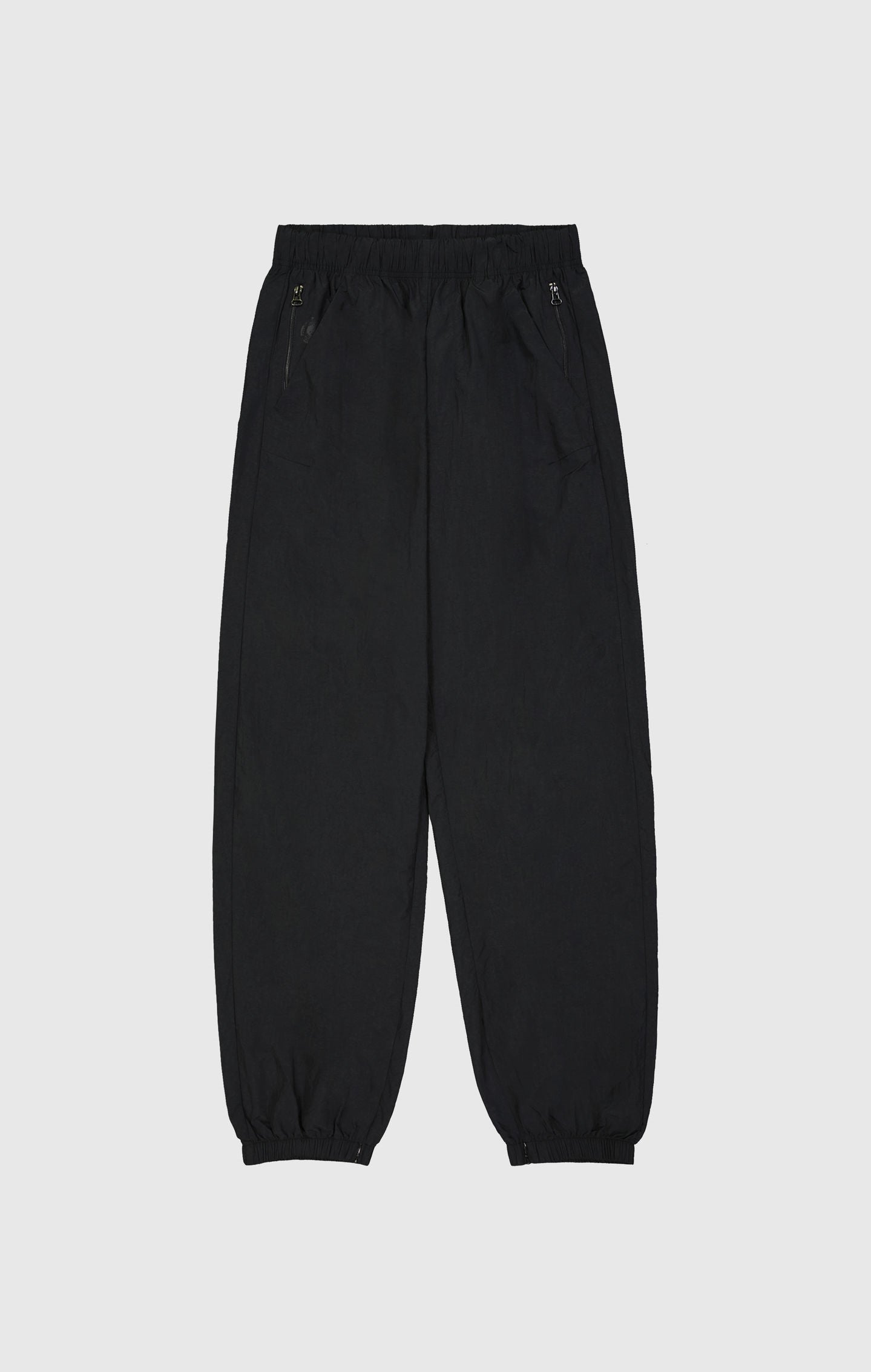 Pantalón de nailon con puños elásticos