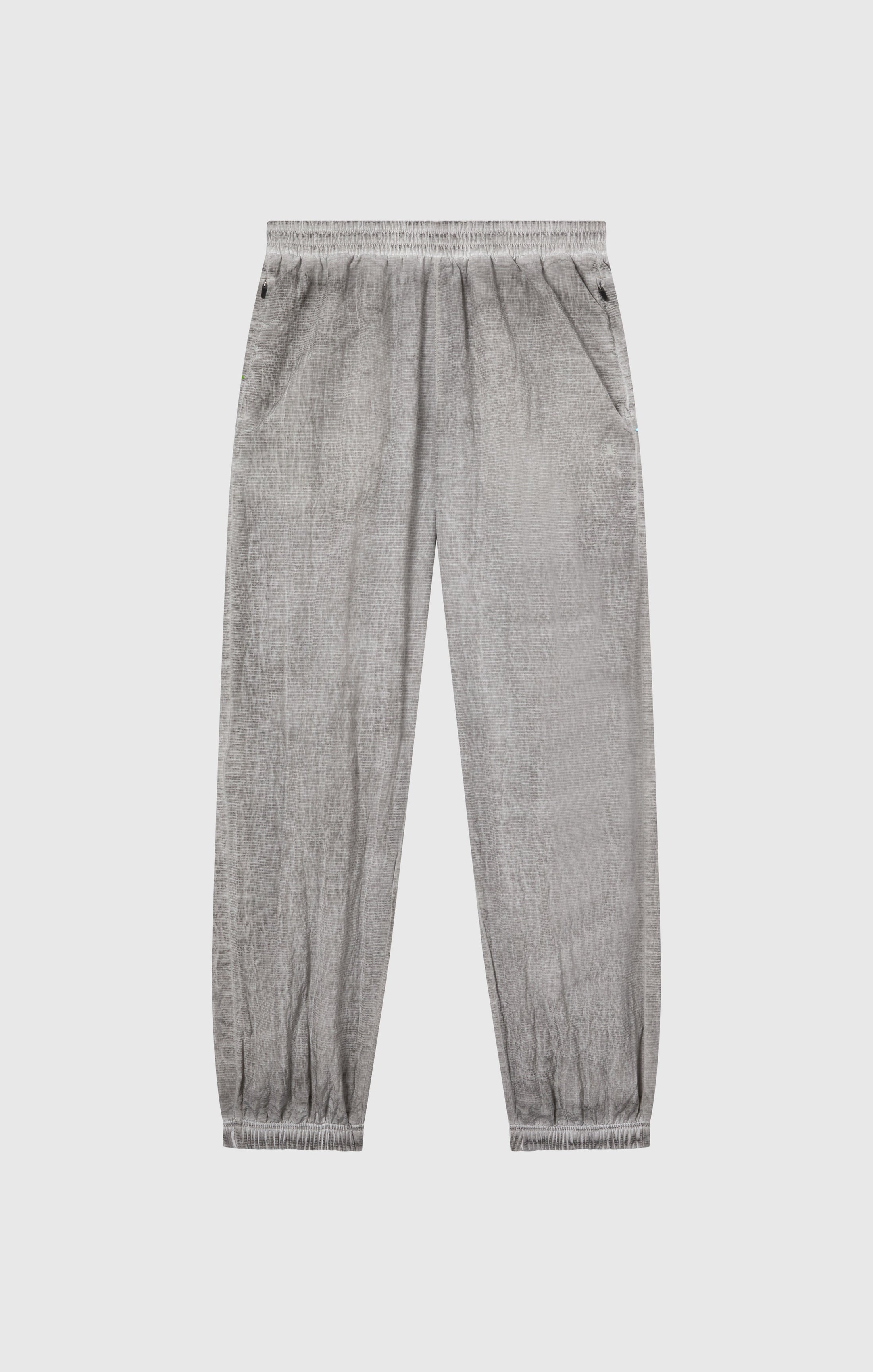 Pantaloni Uomo In Nylon Con Polsini Elastici Effetto Slavato