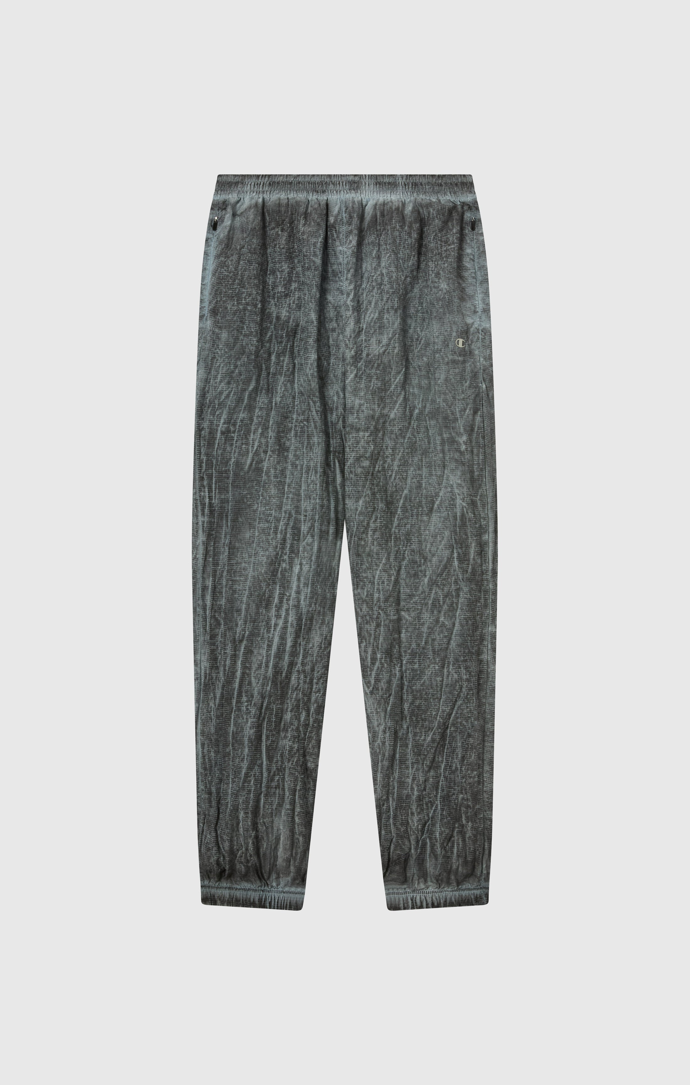 Pantaloni Uomo In Nylon Con Polsini Elastici Effetto Slavato