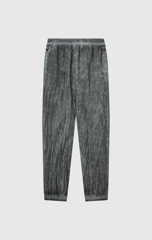 Pantaloni Uomo In Nylon Con Polsini Elastici Effetto Slavato