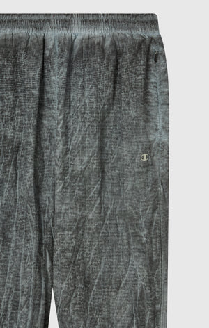 Pantaloni Uomo In Nylon Con Polsini Elastici Effetto Slavato
