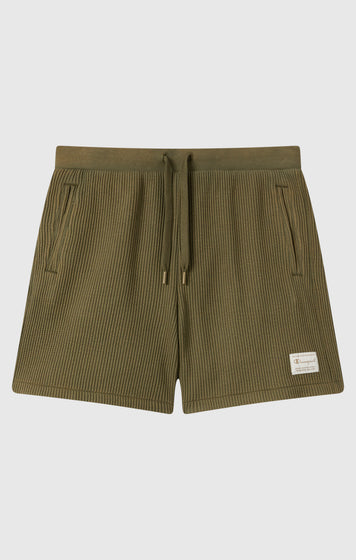 Pantalones cortos bermuda efecto lavado en tejido waffle para hombre