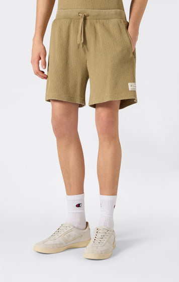 Pantalones cortos bermuda efecto lavado en tejido waffle para hombre
