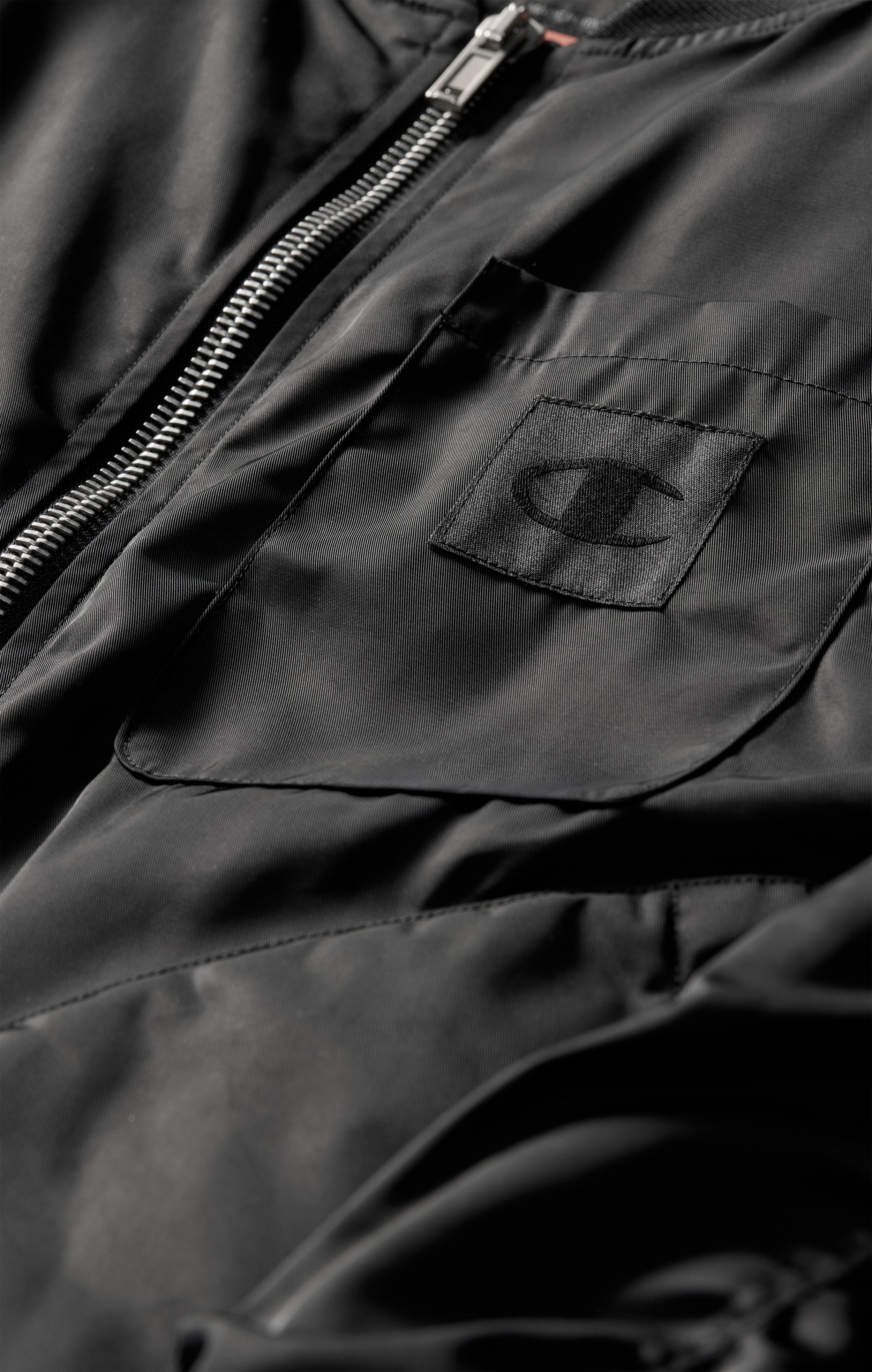 Unisex-Bomberjacke Nowhere University